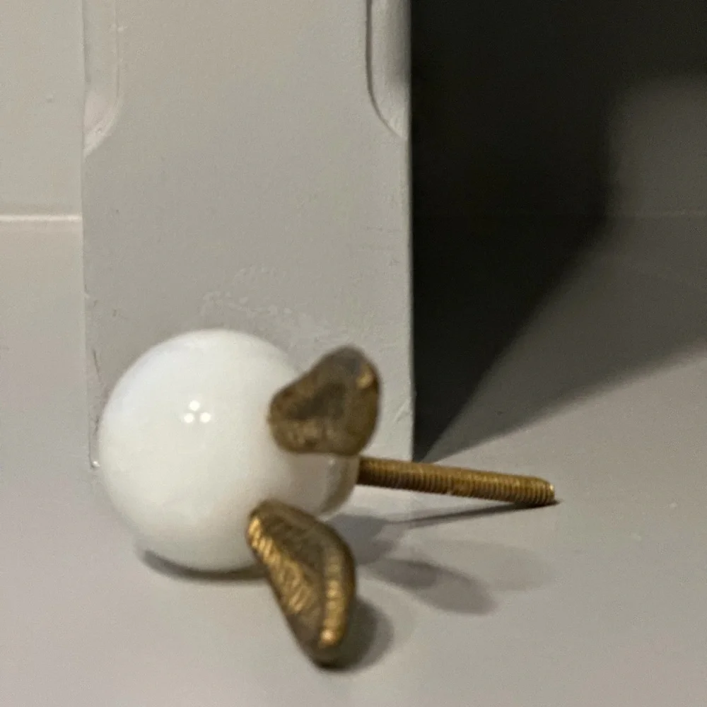 Anthropologie White Ceramic Knob with Gold Bunny Ears